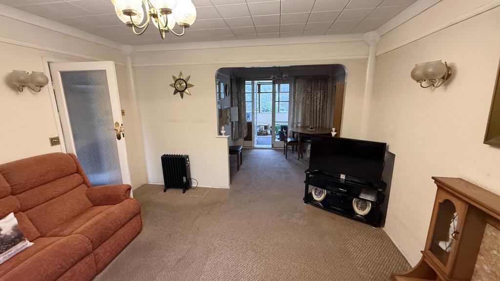 Lot: 160 - VACANT SEMI-DETACHED HOUSE REQUIRING MODERNISATION - Internal image of lounge/dining area from front of lounge